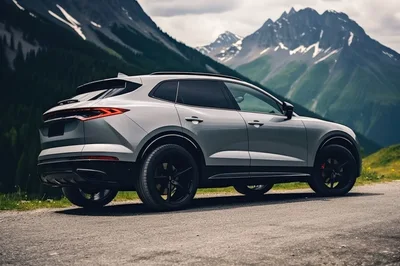 Silver Luxury SUV Parked On Mountain Road