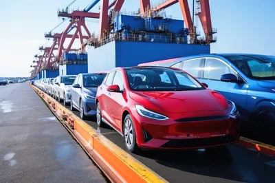 New Electric Cars Parked At Industrial Shipping Port