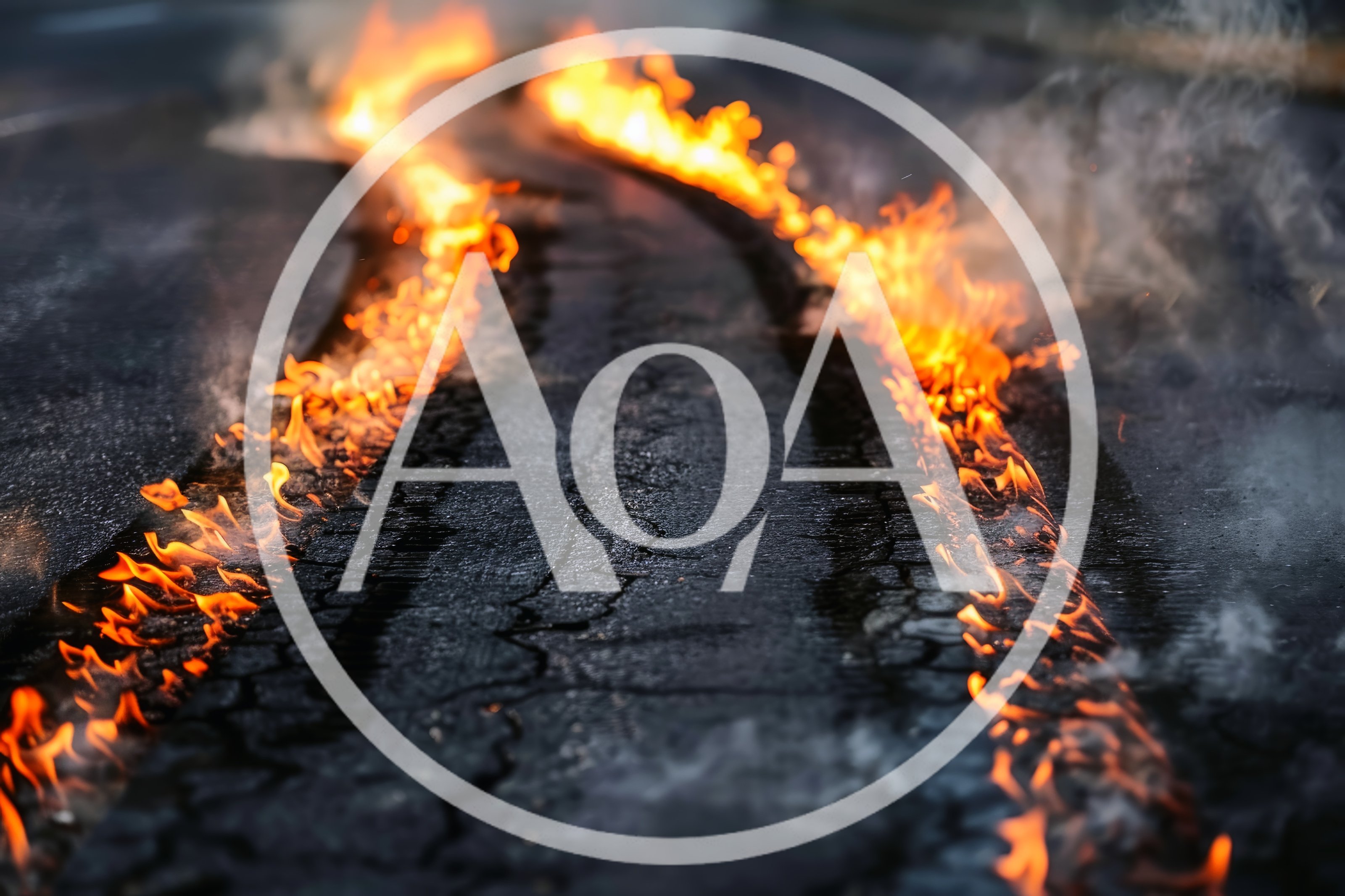 Burning Tire Tracks On Asphalt Road