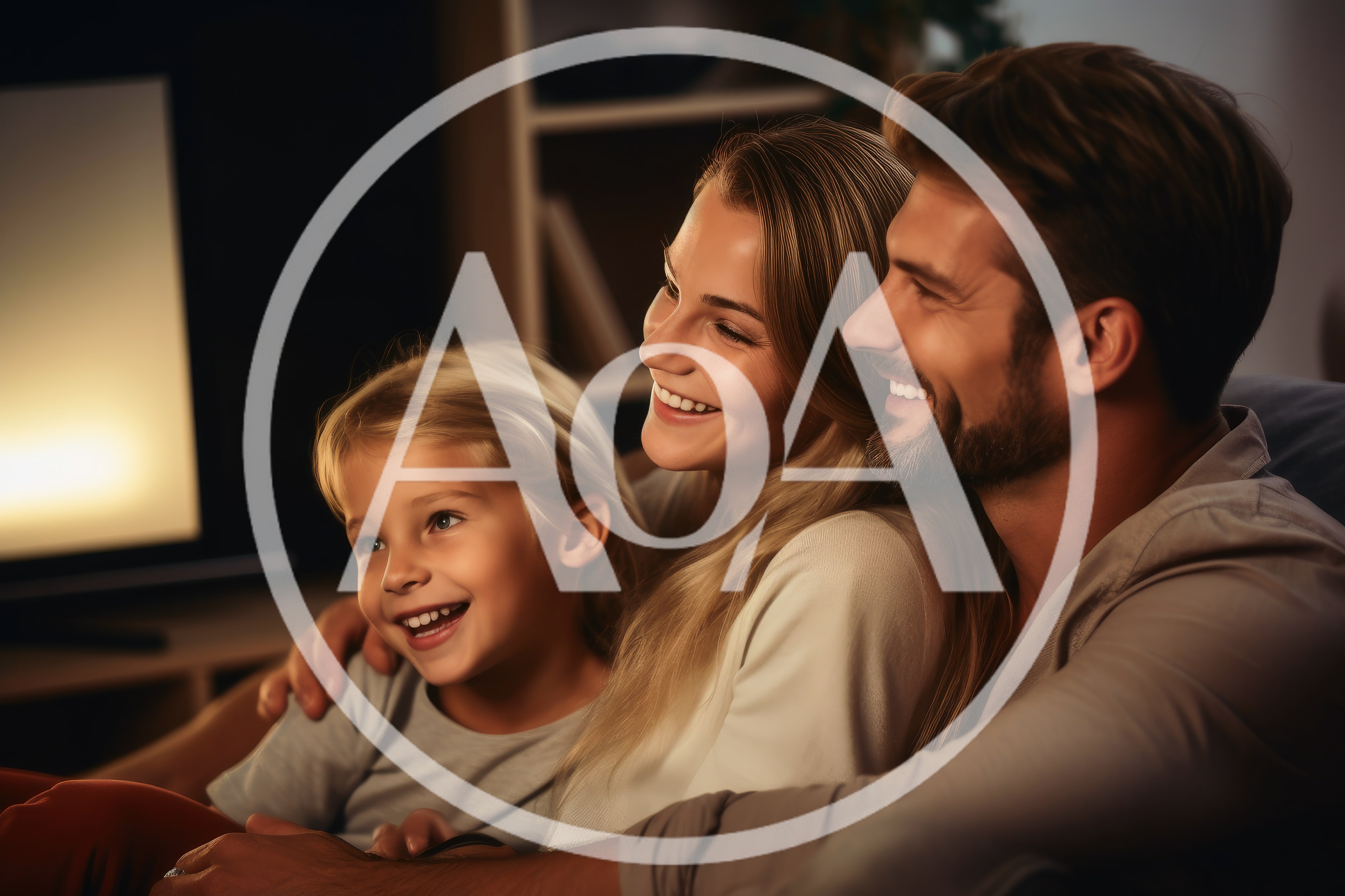 Happy Family Watching Television Together At Home