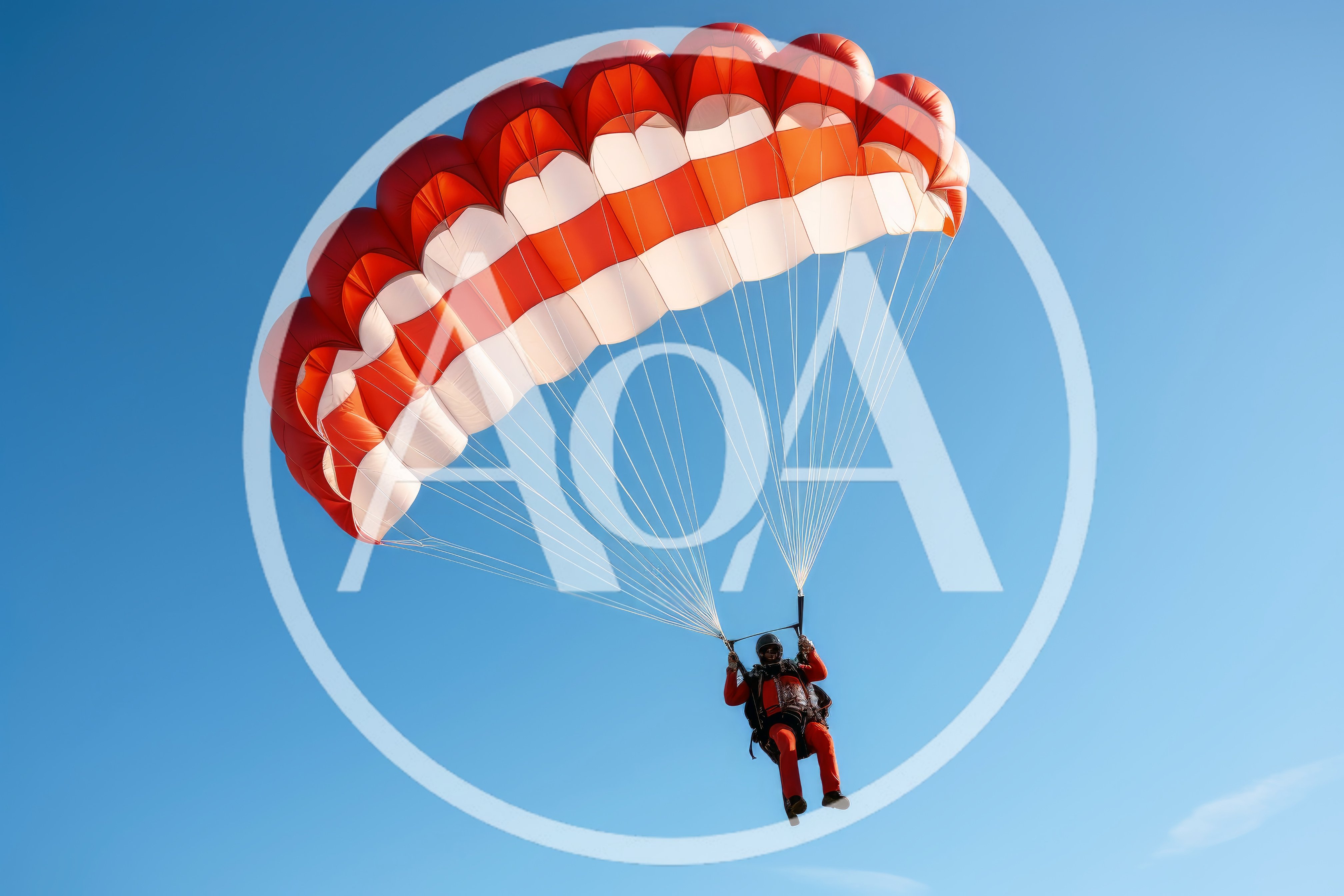 Skydiver Descending With Red And White Parachute
