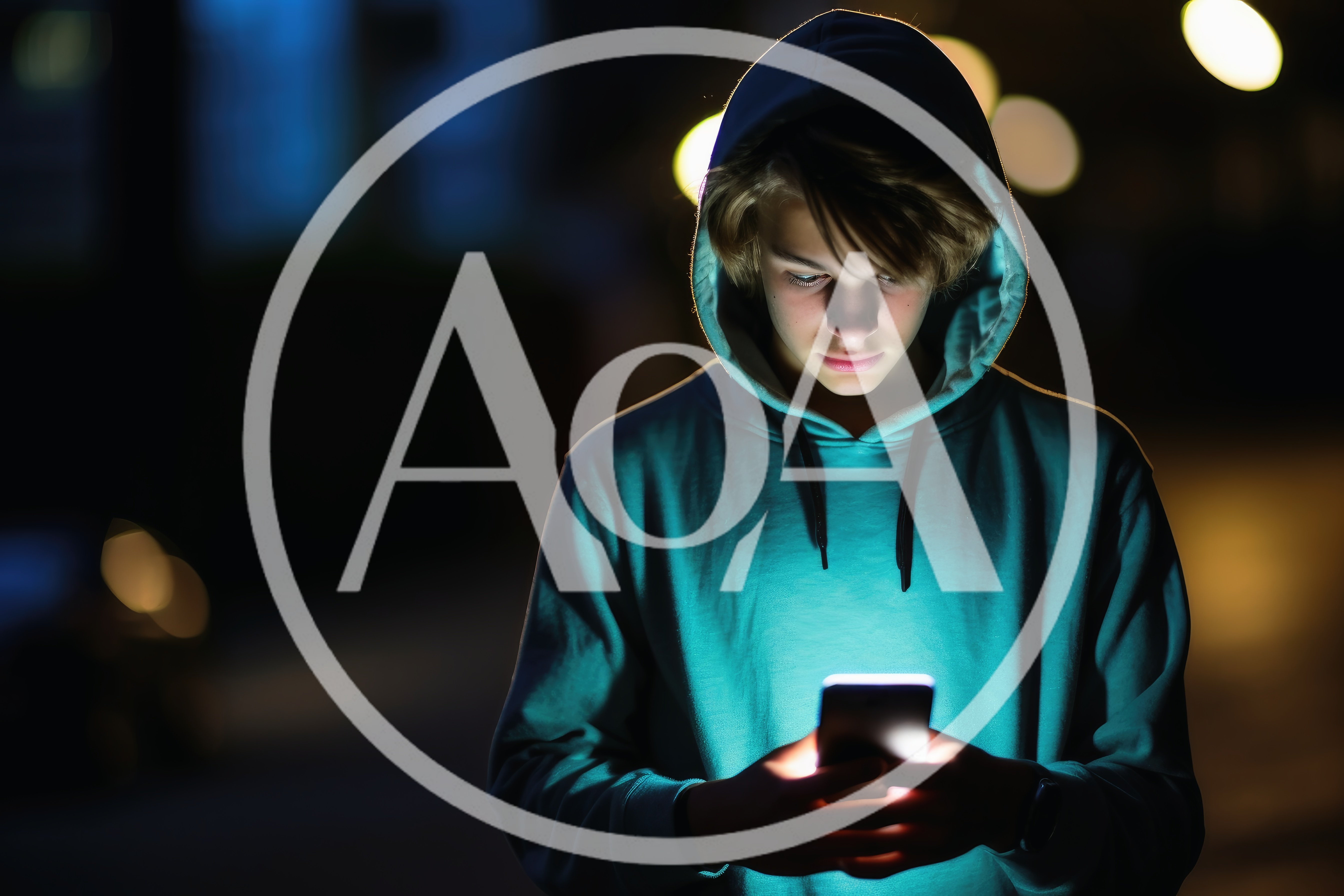 Young Man Using Smartphone In Dark City Street