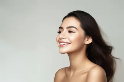 Portrait Of A Smiling Young Woman With Flowing Hair