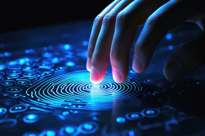 Human Finger Touching Digital Biometric Fingerprint Scanner