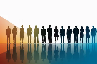 Silhouettes Of Business Professionals Standing In A Row