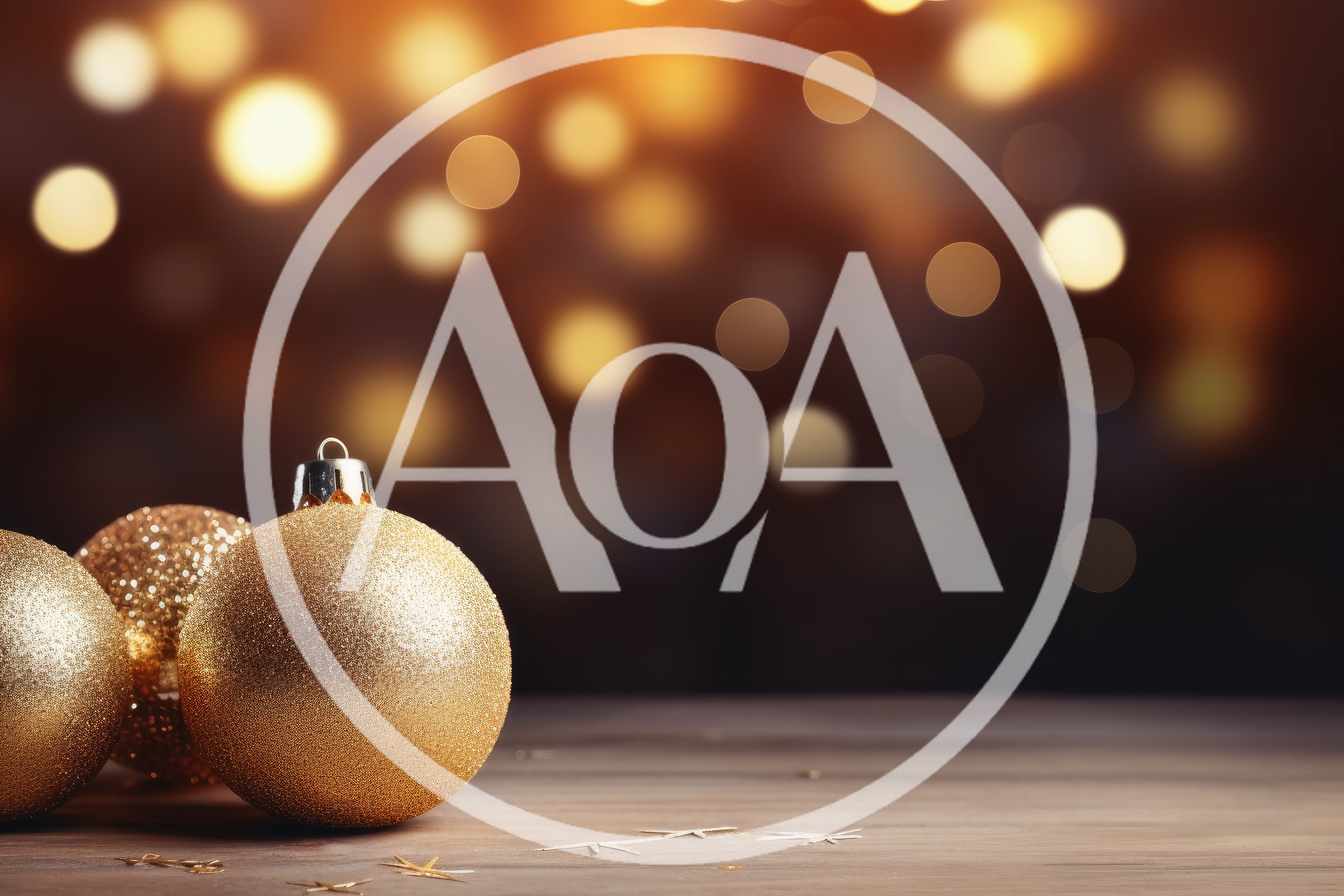 Golden Christmas Ornaments On A Wooden Surface