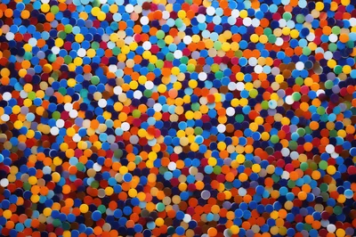 Colorful Plastic Circular Discs Background