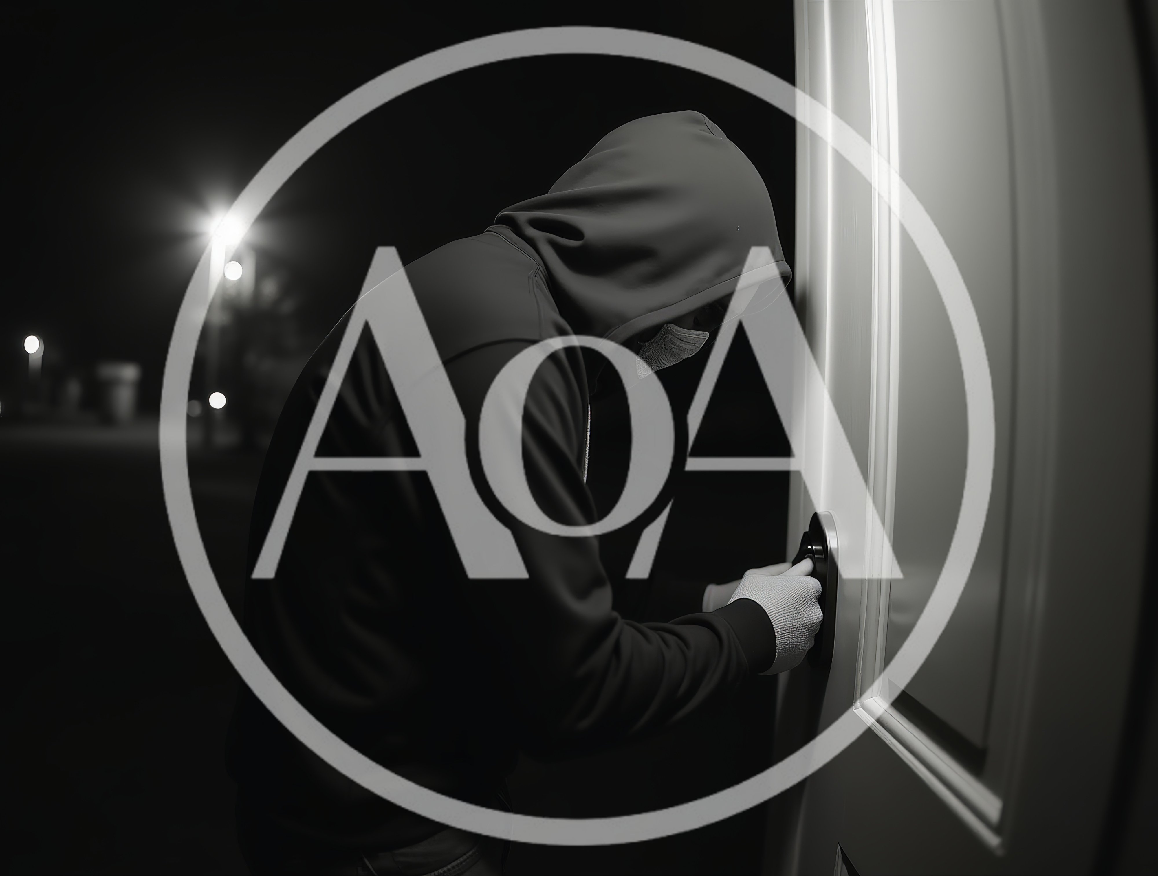 Burglar Attempting To Break Into A House At Night