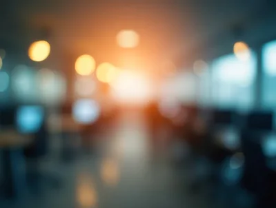Blurred Modern Office Interior With Warm Sunlight