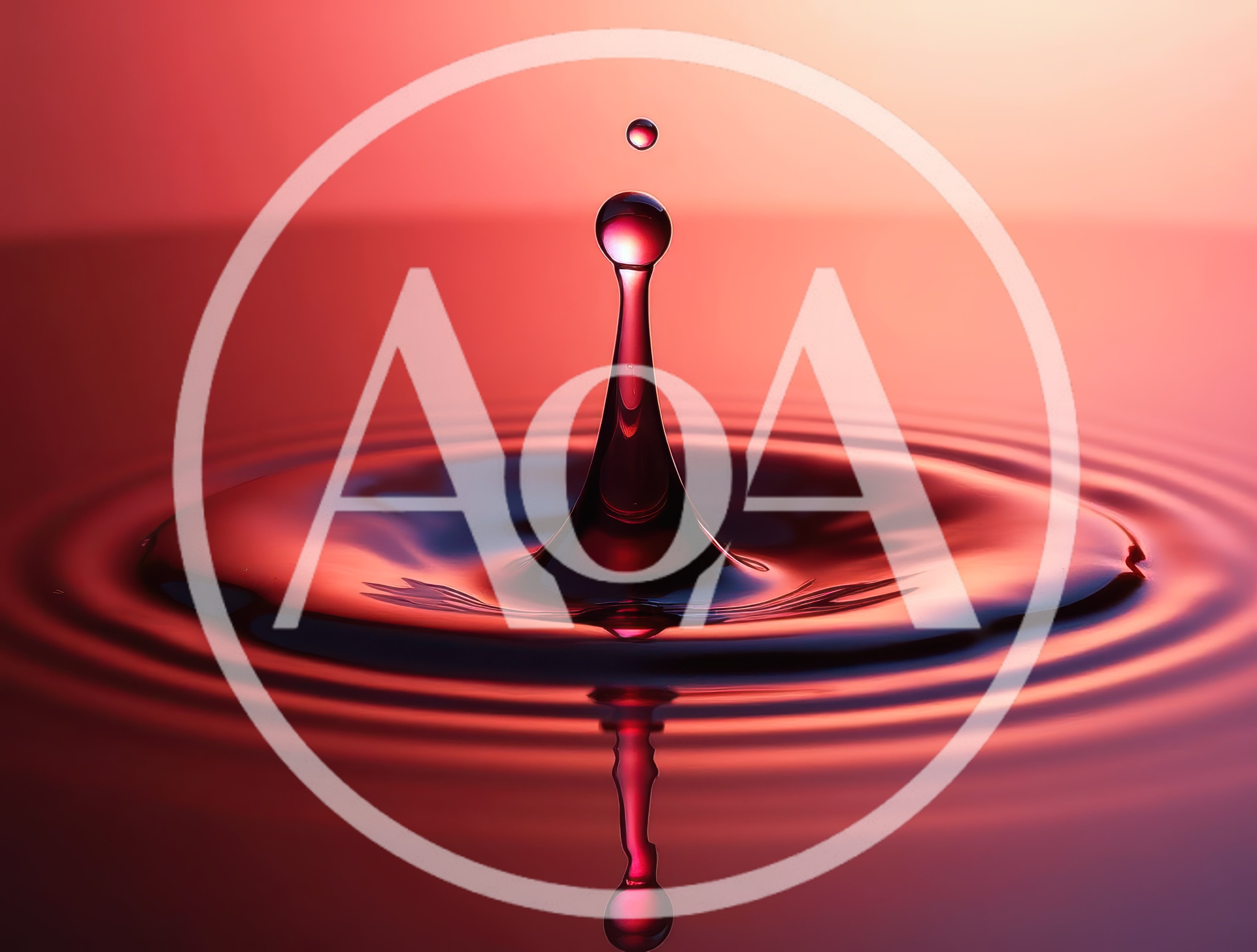 Red Water Drop Impact Creating Concentric Ripples