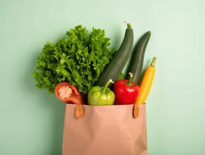 Fresh Vegetables in a Reusable Paper Grocery Bag