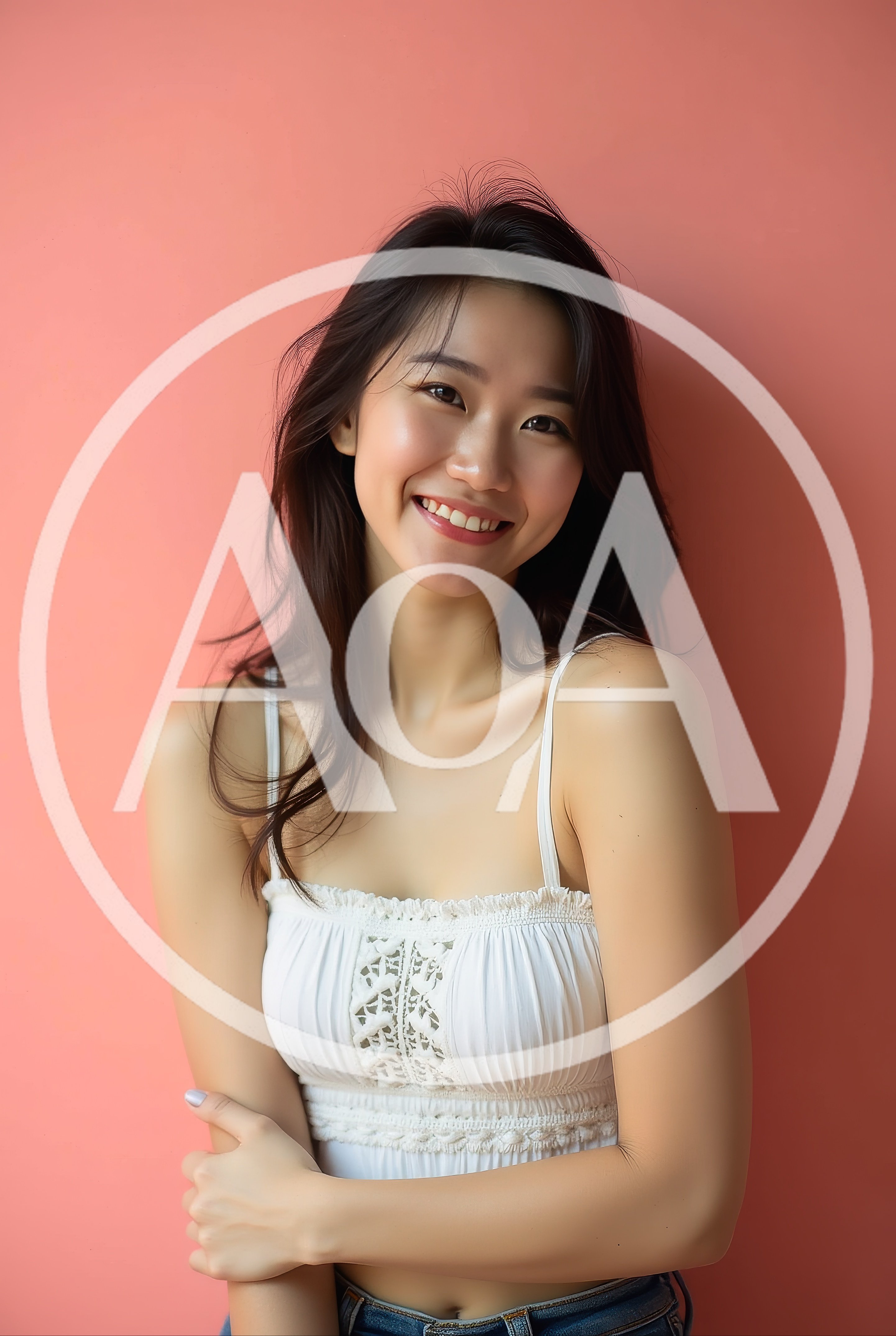 Smiling Young Asian Woman Posing Against Pink Background