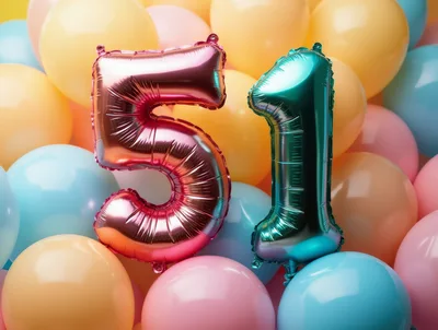 Number 51 Foil Balloons Against Pastel Background