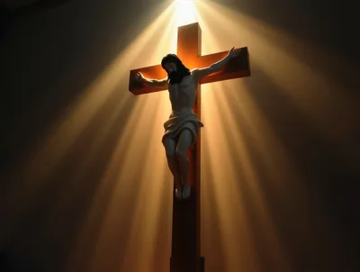 Crucifix Statue Illuminated By Divine Light Rays