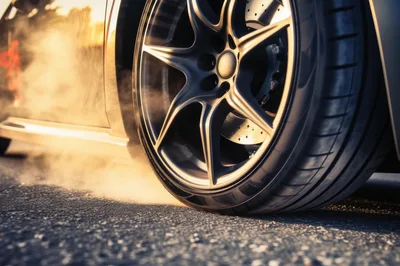 Close Up Of A Sports Car Performing A Burnout