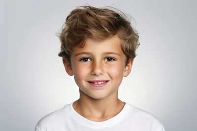Portrait Of A Smiling Young Boy