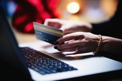 Woman Making Online Purchase With Credit Card