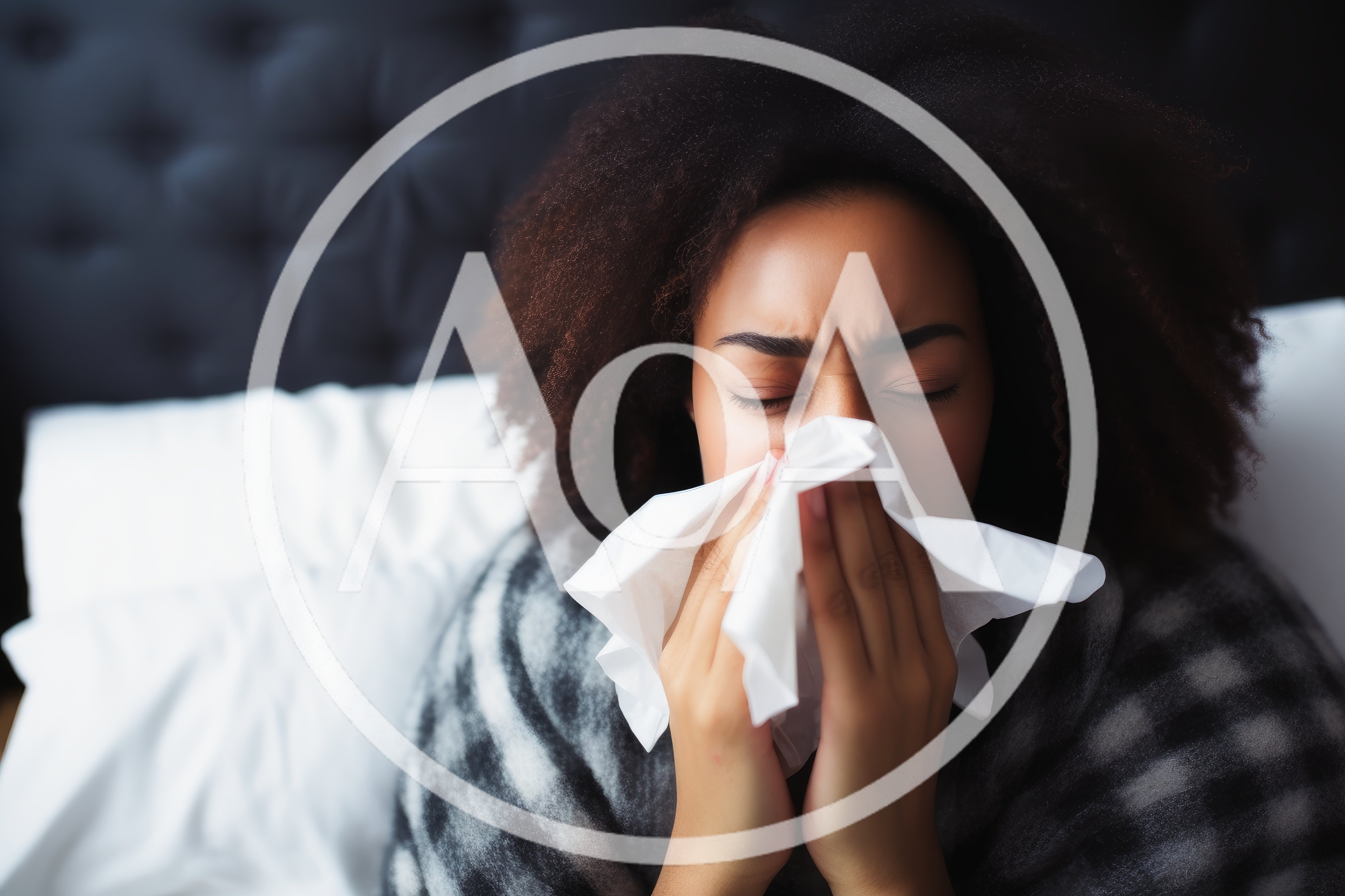 Young Woman Blowing Her Nose In Bed