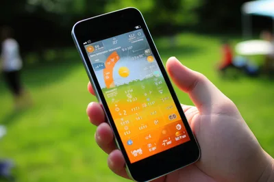 Person Holding Smartphone With Abstract Digital Interface