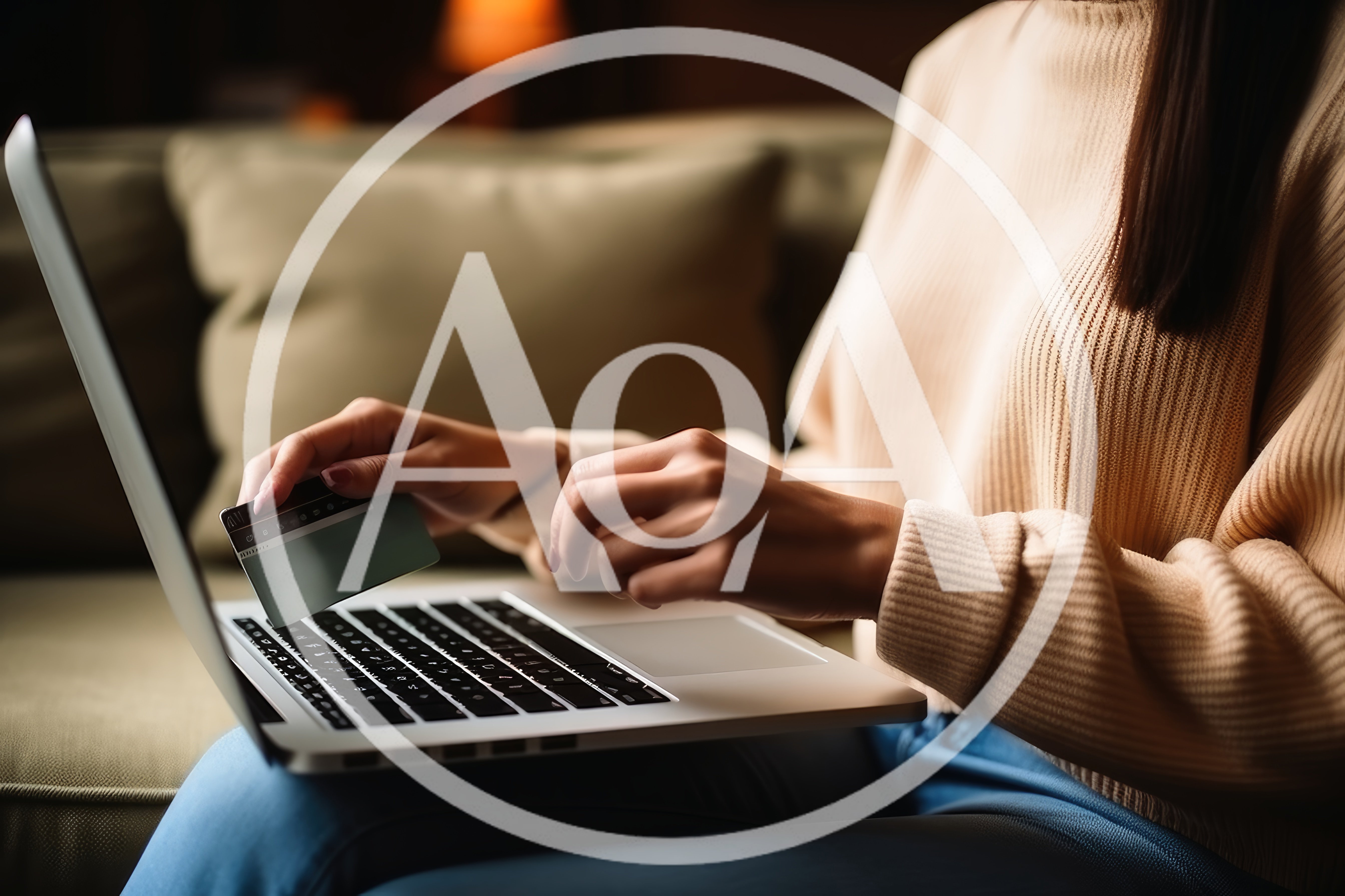 Woman Shopping Online With Credit Card On Laptop