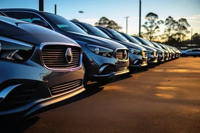 Row Of Modern Luxury Sedans Parked At Dealership