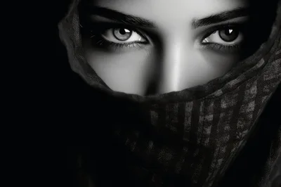 Close Up Portrait Of A Woman Wearing A Headscarf