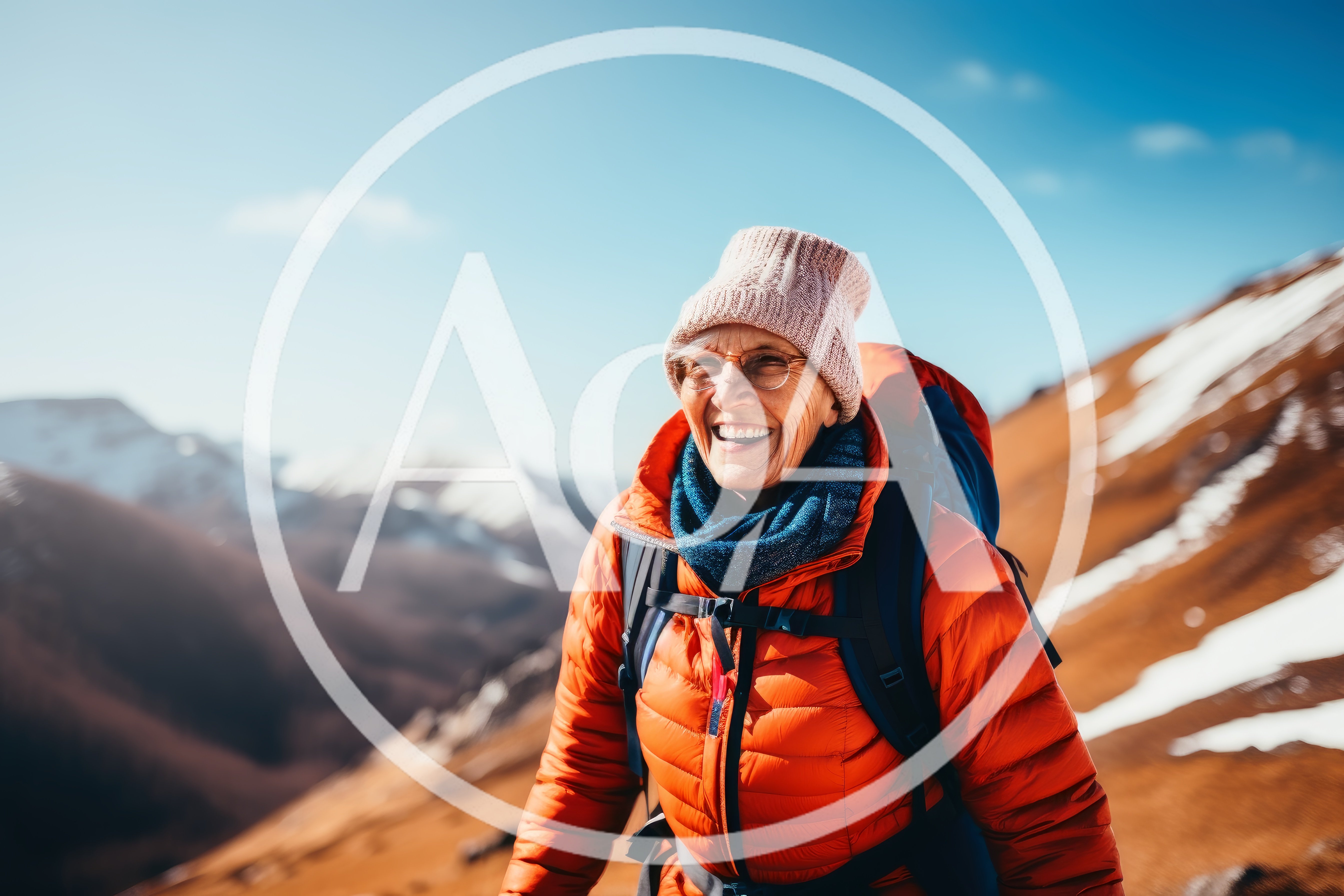 Senior Woman Hiking In Snowy Mountain Landscape