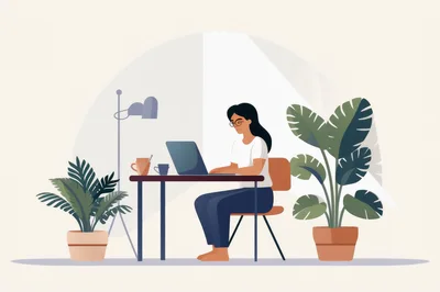 Woman Working On Laptop At Home Office Desk