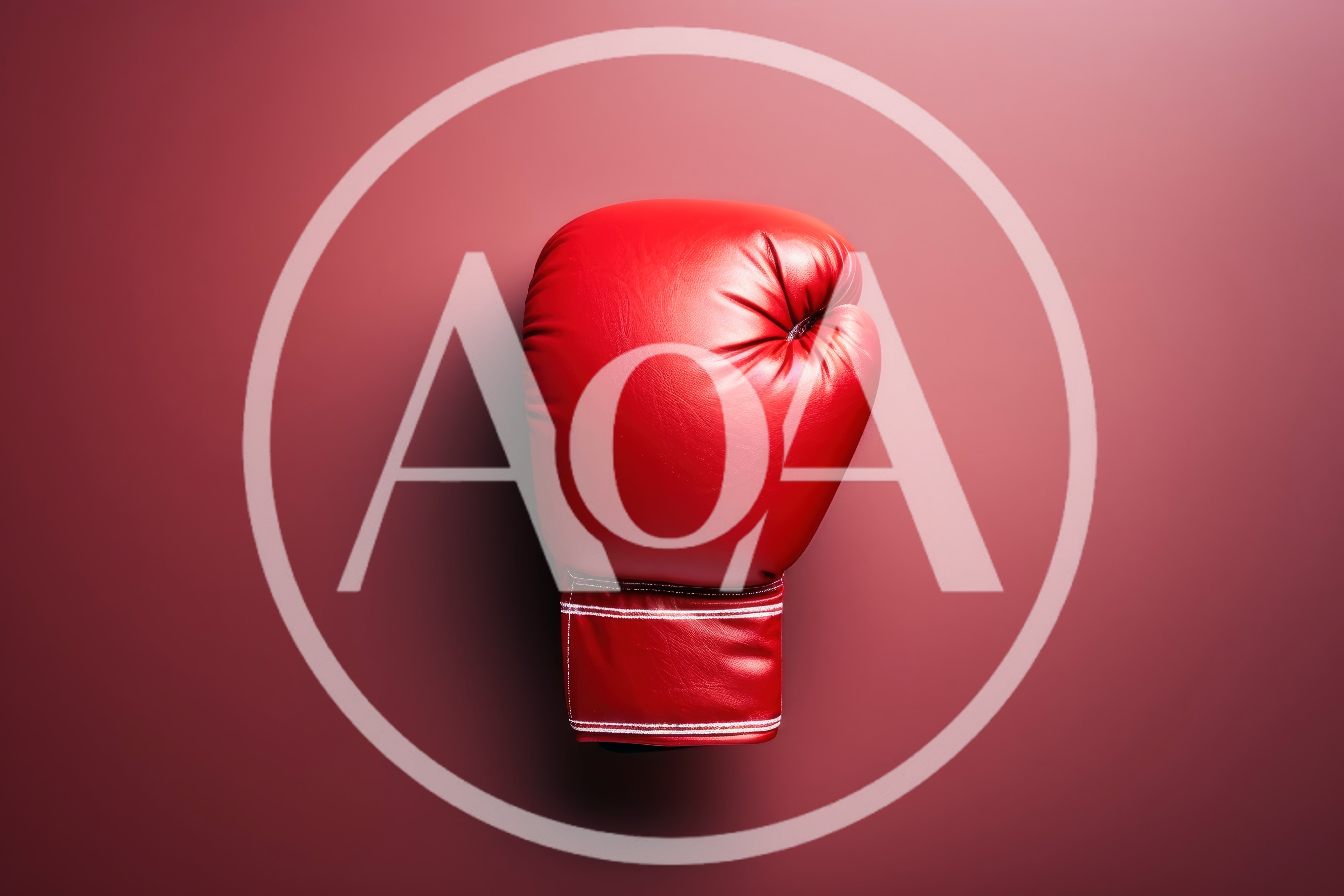 Single Red Boxing Glove on Solid Background