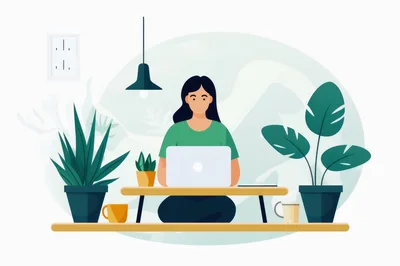 Woman Working On Laptop At Home Desk