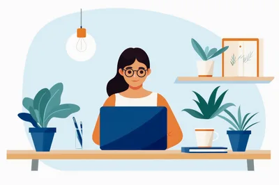 Woman Working On Laptop At Home Office Desk