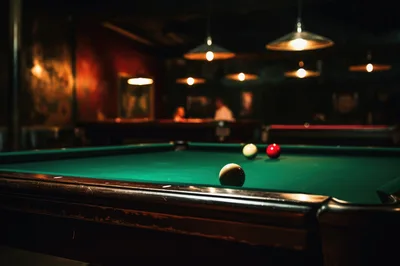 Billiard Balls On A Green Felt Pool Table