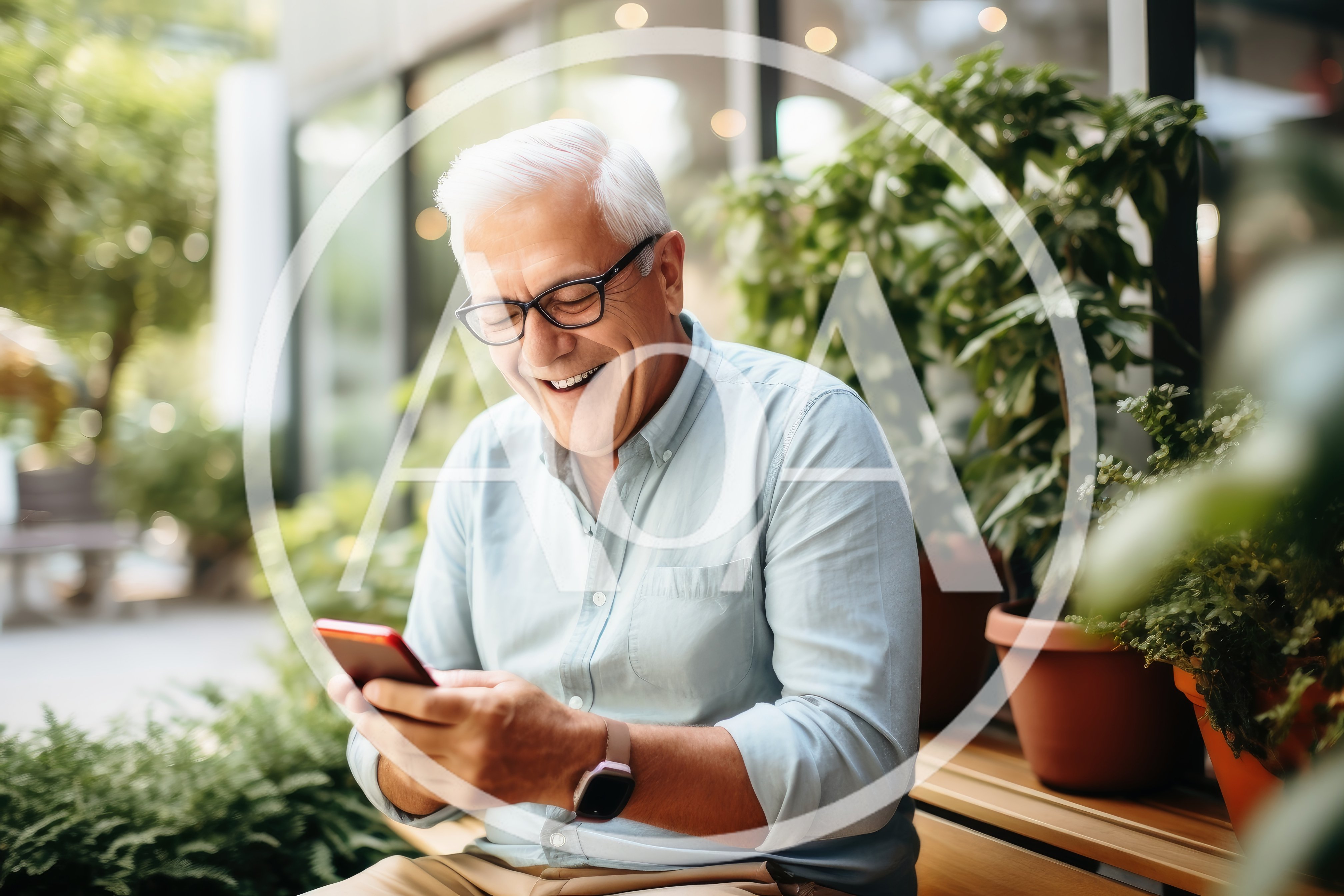 Senior Man Laughing While Using Smartphone Outdoors