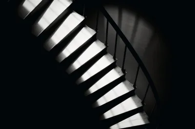 High Angle View Of A Dark Spiral Staircase