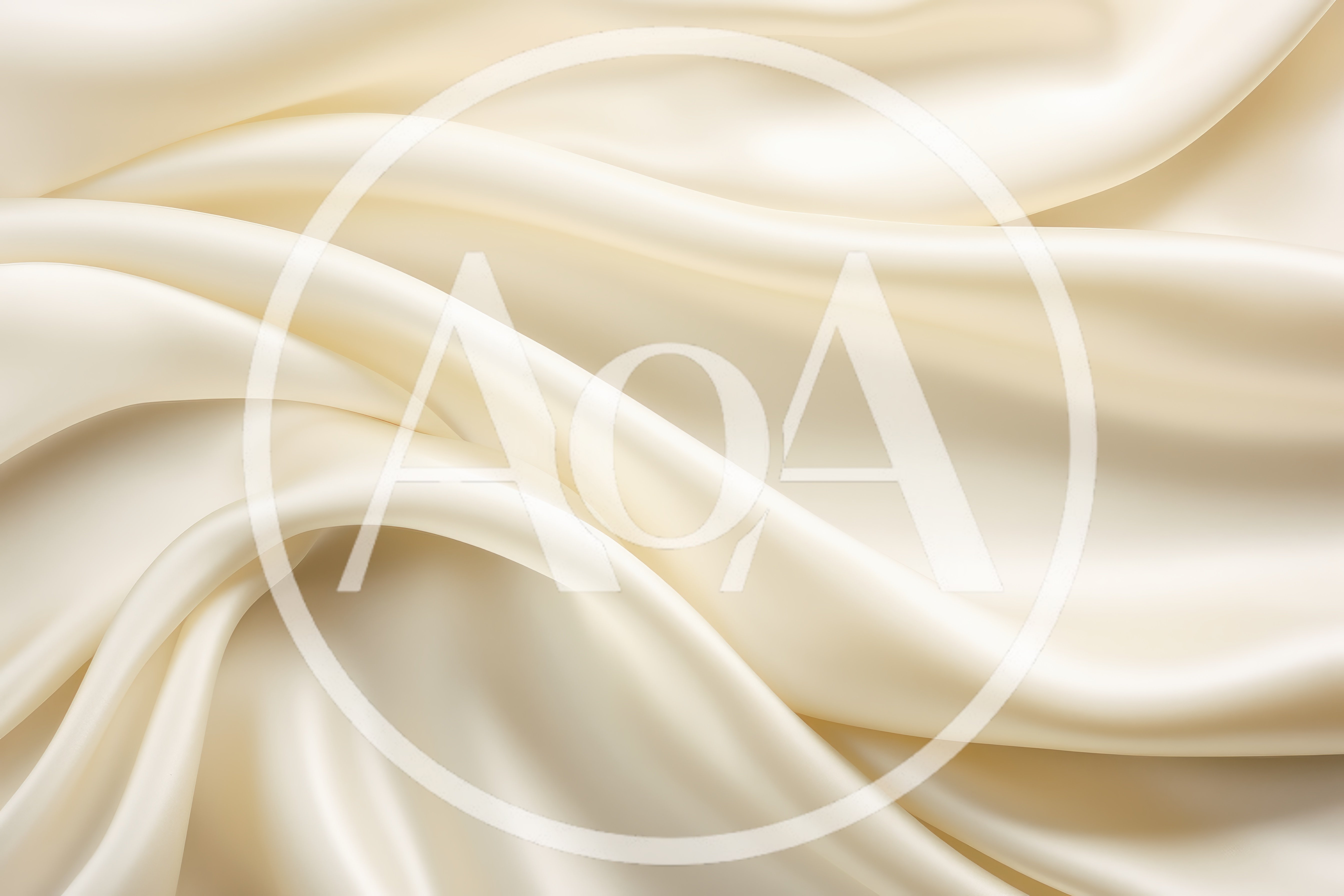 Elegant Cream Silk Fabric With Soft Flowing Folds