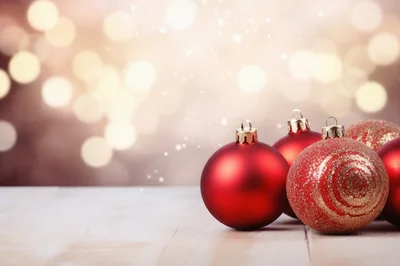 Red Christmas Ornaments on Wooden Surface