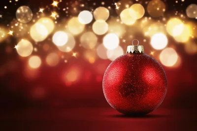 Red Glittery Christmas Ornament On Dark Background
