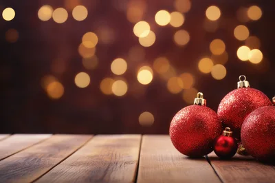 Red Christmas Ornaments on Wooden Table