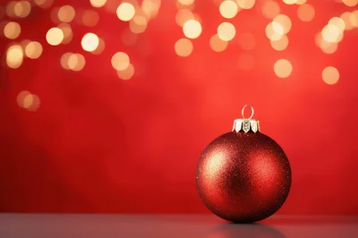 Red Christmas Ornament Ball on Red Background