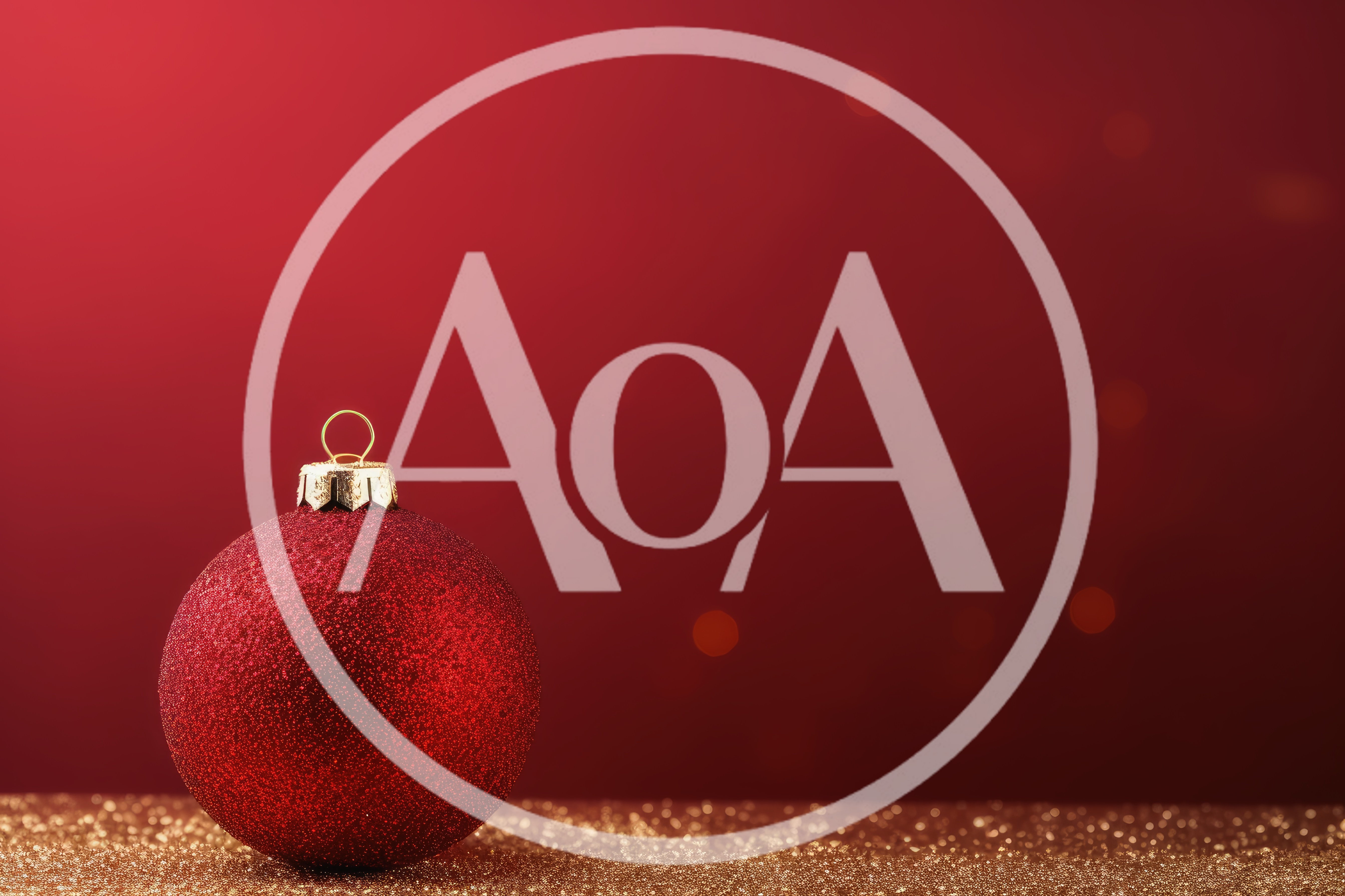 Red Glitter Christmas Ornament on Gold Surface