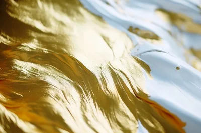 Abstract Liquid Gold And White Paint Swirls