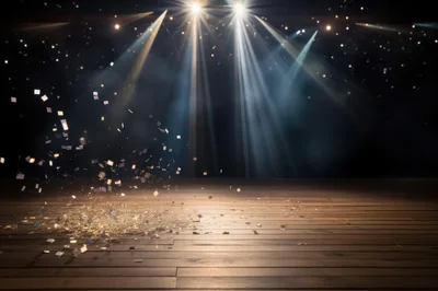 Confetti Falling On A Wooden Stage Under Spotlight