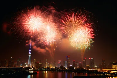 Fireworks Display Over The City Skyline At Night