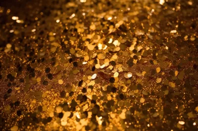 Macro Close Up Of Golden Glitter Texture