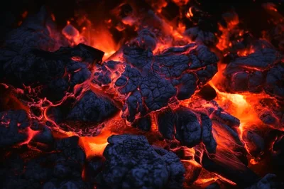 Glowing Hot Charcoal Embers In A Fireplace