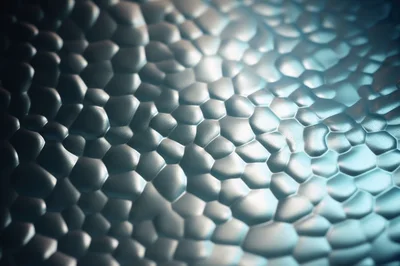 Abstract Metallic Hexagonal Cellular Surface Texture
