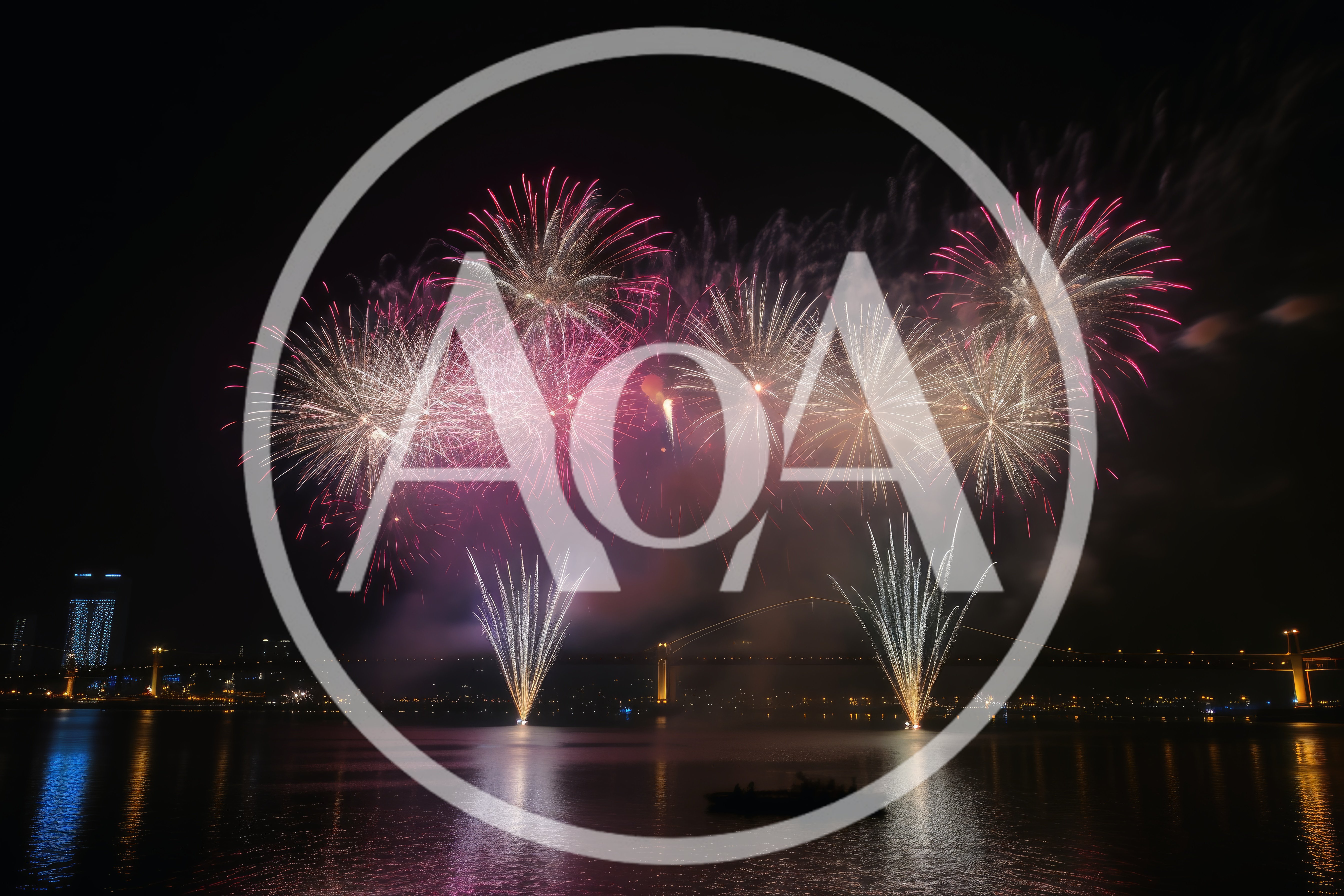 Vibrant Fireworks Display Over A River At Night