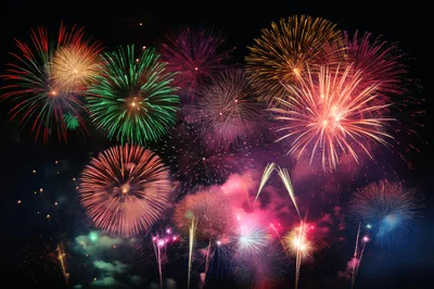 Vibrant Multi-Colored Fireworks Display Against Night Sky