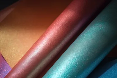 Abstract Background of Rolled Metallic Shimmering Paper