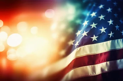 American Flag Waving With Soft Bokeh Background